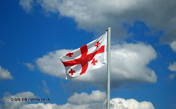 Georgian flag, blue sky